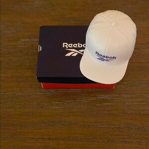 Reebok MINIS toy hat and sneakers.